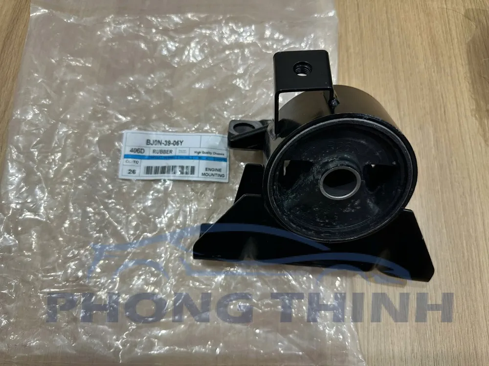 Chân đầu máy Ford Laser 1.8 2000-2005 OEM BJ0N3906YE