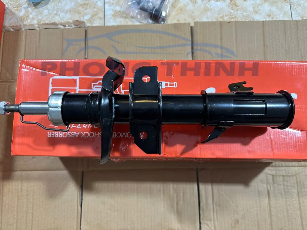 Giảm sóc trước Mazda 2 2010-2014 bên lái LH OEM D04A34900C