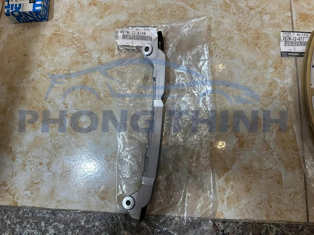 Hình ảnh sản phẩm Tỳ xích cam thẳng Mazda 3, Mazda 6 & CX5 2.0 chính hãng - PE7W12614A